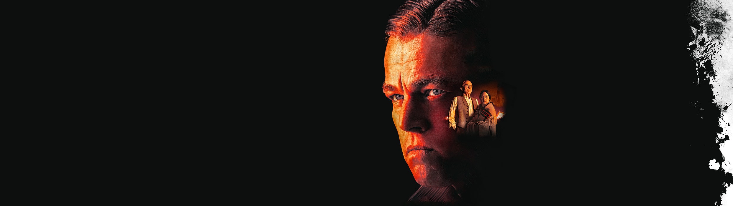 Leonardo Dicaprio looks to the side of a man and a Native American woman in Killers Of The Flower Moon, coming to Harkins in October! 